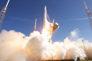 Falcon 9 rocket and Dragon capsule liftoff